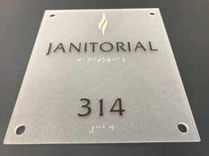 ADA Signage for a Janitorial Room - Iowa ADA Signage Company - American Marking Inc.